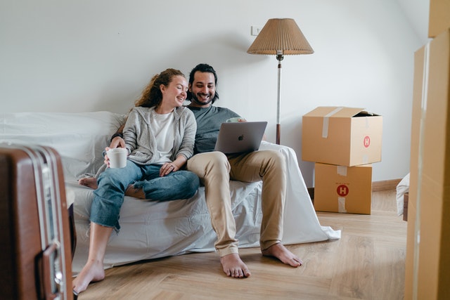 Happy couple after get a moving quote