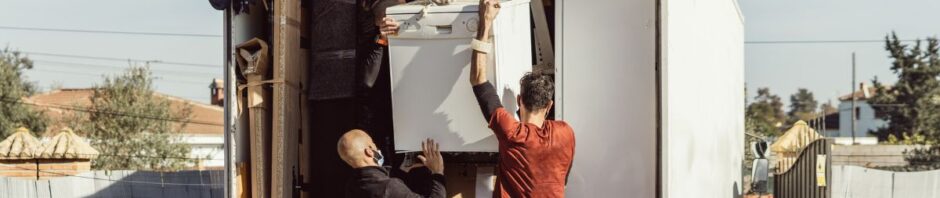 Jersey City moving company offering reliable relocation services Movers Newark NJ loading boxes into a moving truck Professional movers in NJ handling residential and office moves