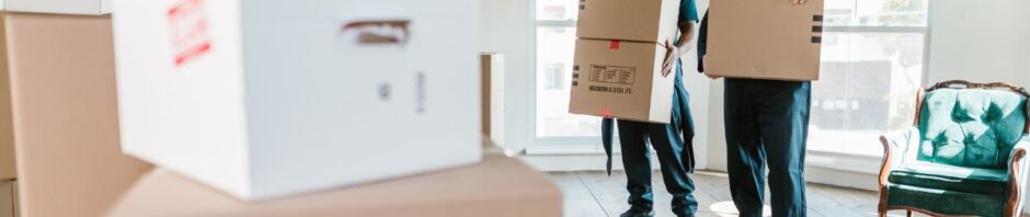 local movers NJ team loading furniture into truck — top Jersey City movers service” “crew from top Jersey City movers carrying sofa in local movers NJ uniforms