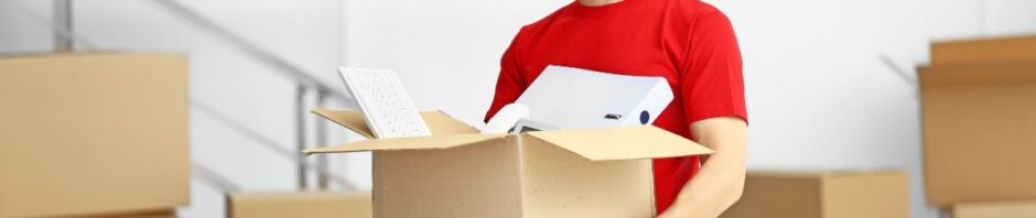 Moving companies in Newark NJ packing furniture Top Jersey City movers loading moving truck Professional movers handling relocation across New Jersey