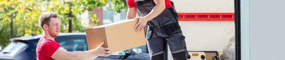 Professional Newark NJ movers carrying furniture during a house move
